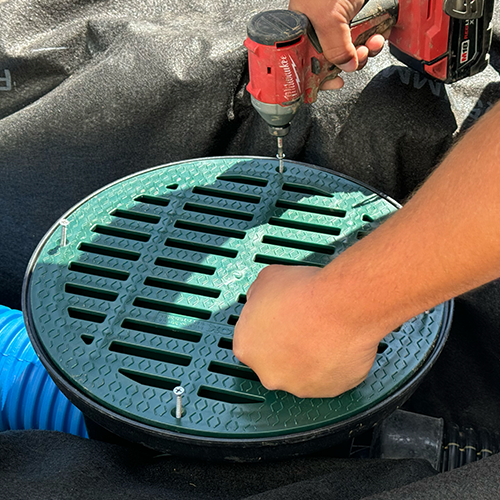Catch basin lid attached